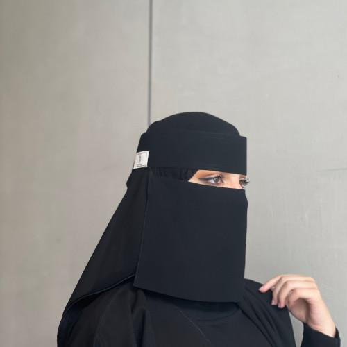 دنيا بطمة ترتدي النقاب في أولى جلسات الطلاق من الترك